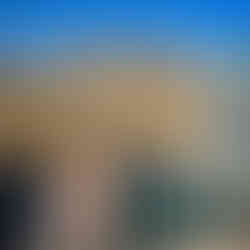 woman in bikini stands in Hot Springs in the desert