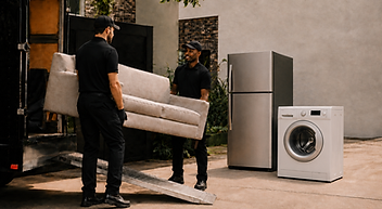 Crew removing a refrigerator and washer during furniture and appliance removal in Indianapolis.