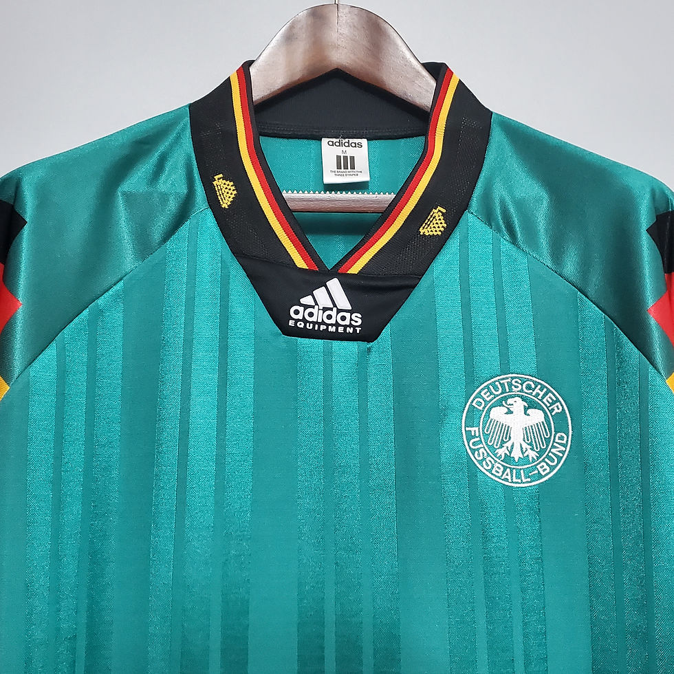 Thumbnail: Green Germany retro football shirt with Adidas logo and text detail.