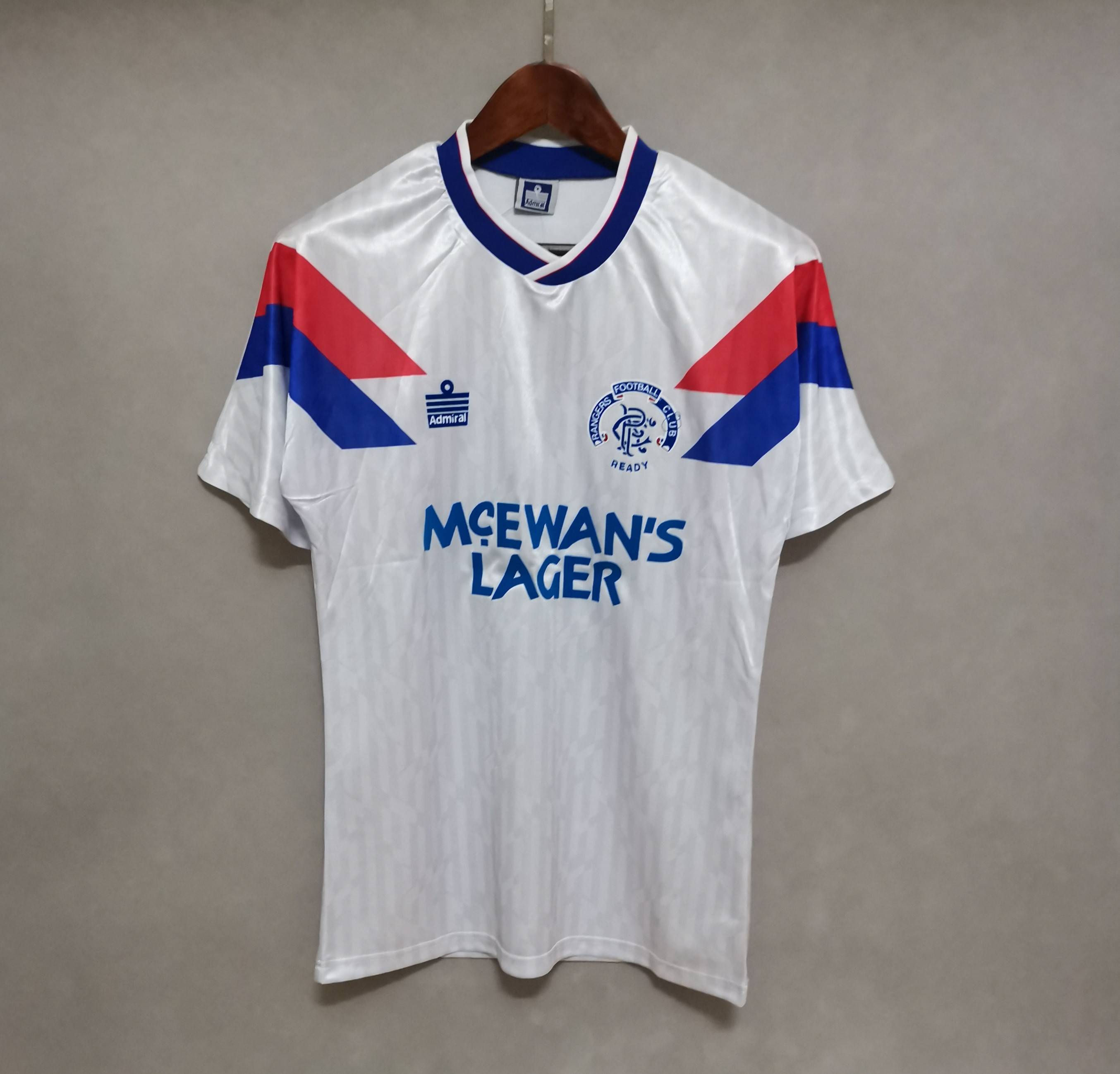 White Rangers football jersey with 'MCEWAN'S LAGER' text, retro design, nostalgia retro kit.