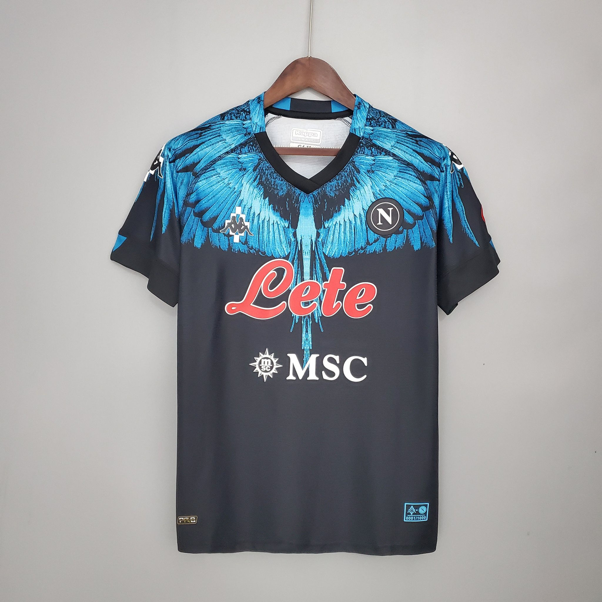 Napoli football shirt with "Lete" and "MSC" logos on black background. Nostalgia Retro Kit