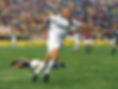 Ronaldo celebrates a goal in white and black kit on the football field