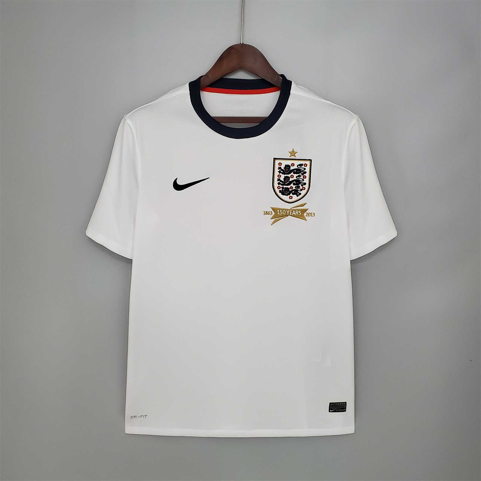 England white jersey with Nike logo and crest. Nostalgia Retro Kit on display.
