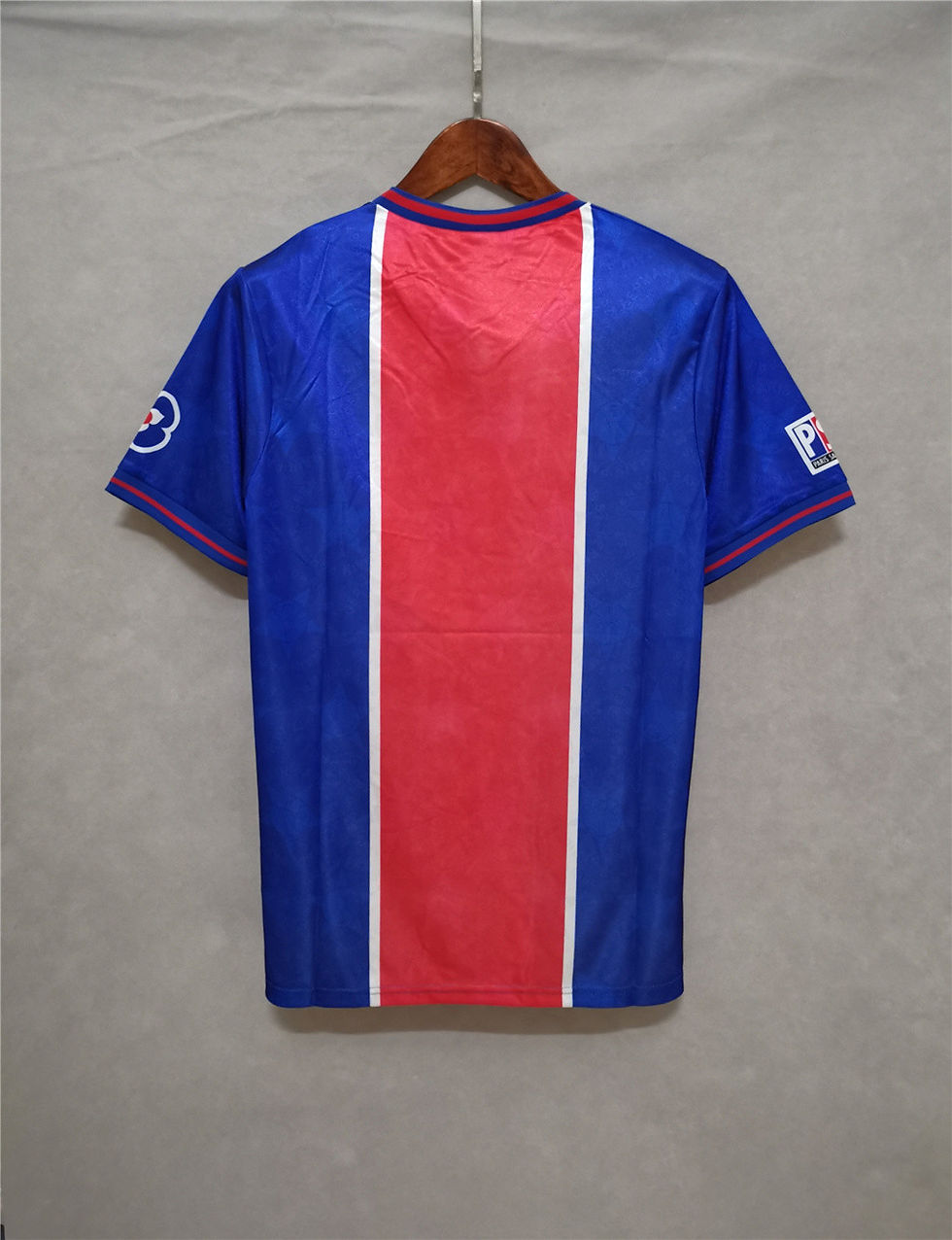Thumbnail: Blue and red vertical striped football shirt. Professional sports jersey design.