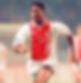 Jari Litmanen in Ajax Amsterdam jersey with ABN AMRO 1995/1996 AJAX AMSTERDAM HOME RETRO KIT Nostalgia Retro Kit
