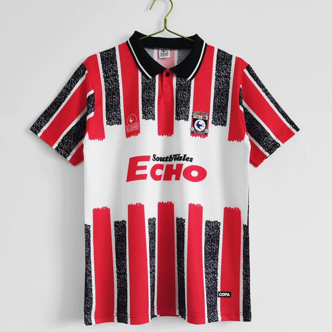 Retro football shirt with red stripes, white background, and Echo text Nostalgia Retro Kit