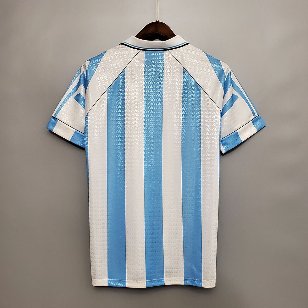Thumbnail: Retro football jersey with blue and white stripes on display. Nostalgia Retro Kit
