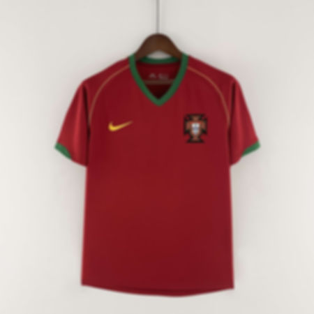 Portugal national team red jersey with crest and Nike logo design.