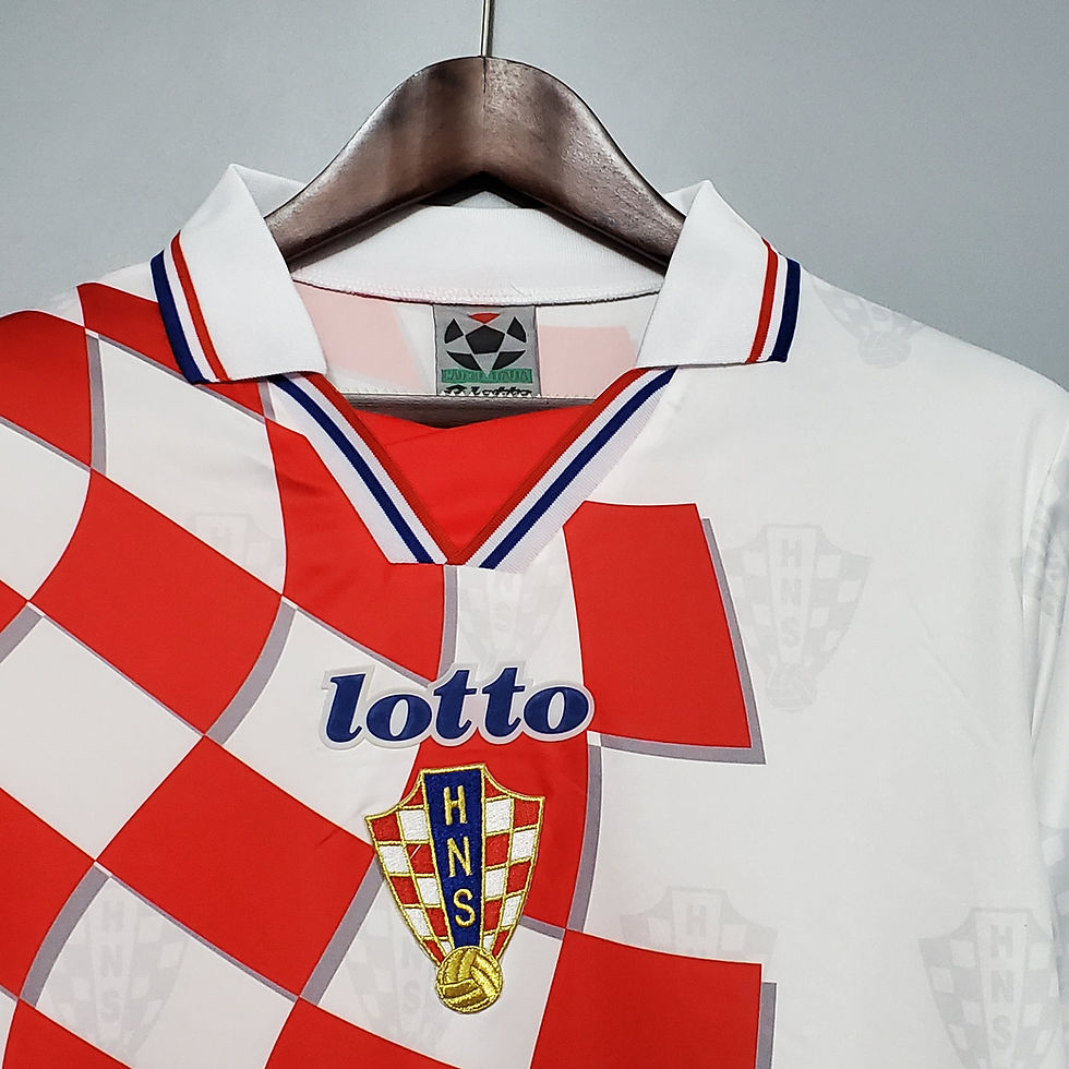 Thumbnail: Croatian national team jersey, lotto logo and emblem, retro kit design, white and red.