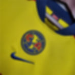 Thumbnail: Club America yellow jersey with the Nike logo, visible text, and details.