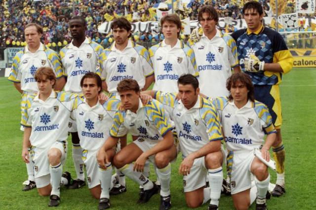 Football team in white and yellow kits, vintage group photo, Parmalat. Nostalgia Retro Kit