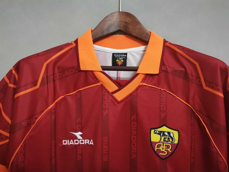 Thumbnail: AS Roma soccer jersey closeup with Diadora logo and a retro collar