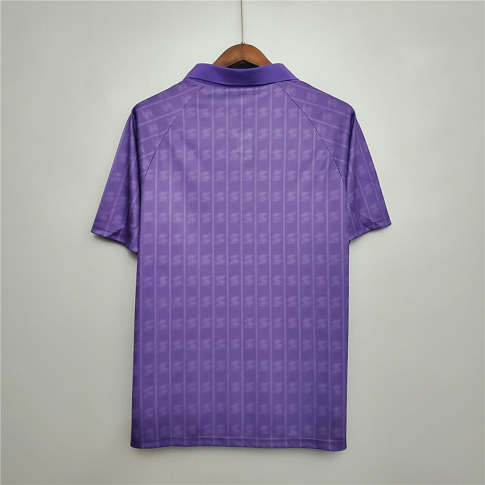 Thumbnail: Purple retro jersey back view, hanging on a wooden hanger. Nostalgia Retro Kit