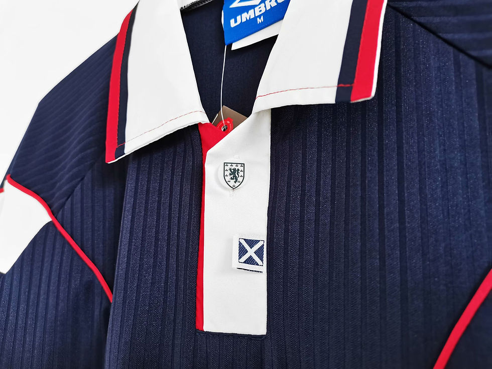 Thumbnail: Navy blue Scotland retro jersey with Umbro tag and Scotland badge detail.