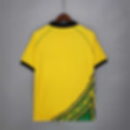 Thumbnail: Yellow jersey with black collar and sleeves, green and black design. Nostalgia Retro Kit