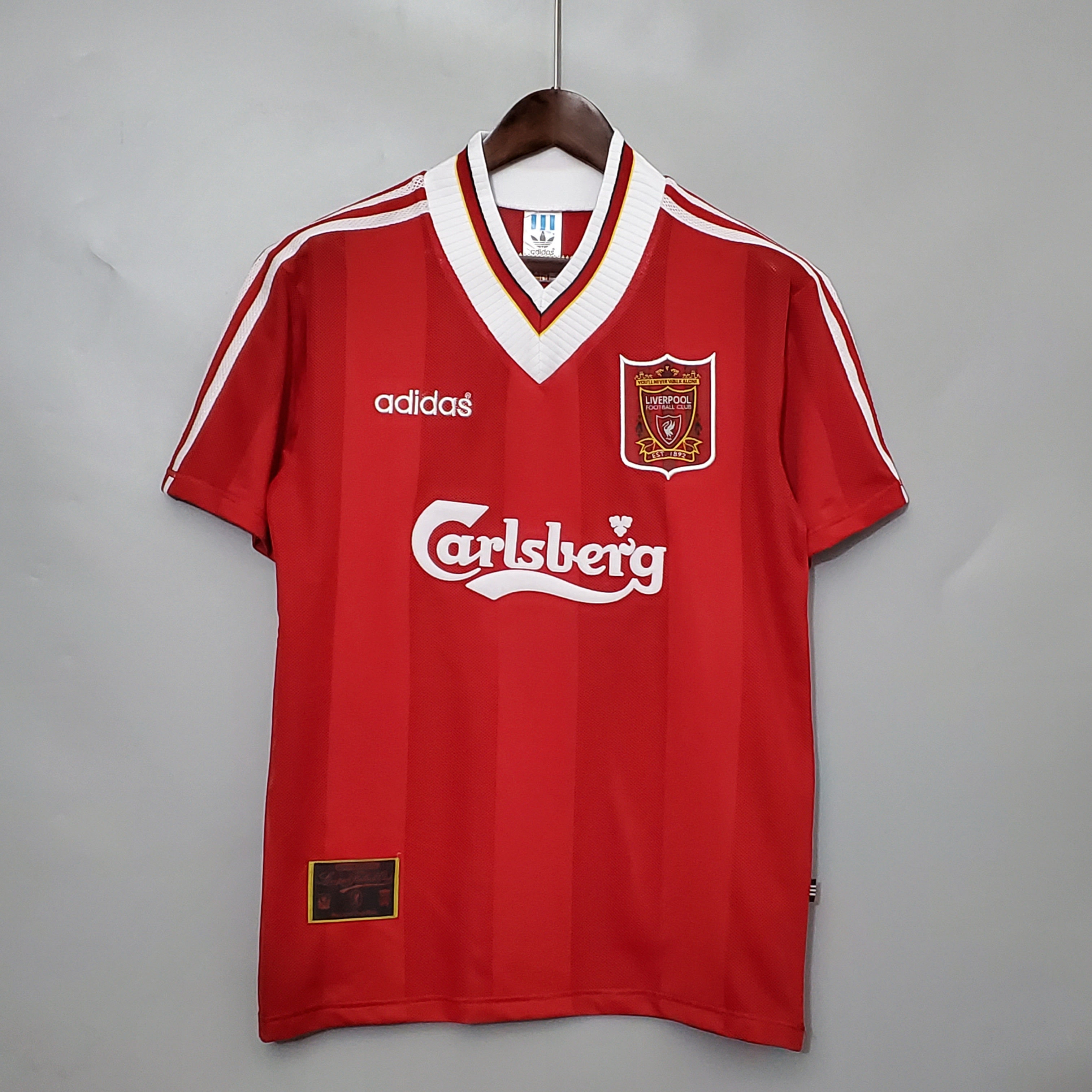 Liverpool football shirt Adidas logo and Carlsberg sponsor vintage football kit
