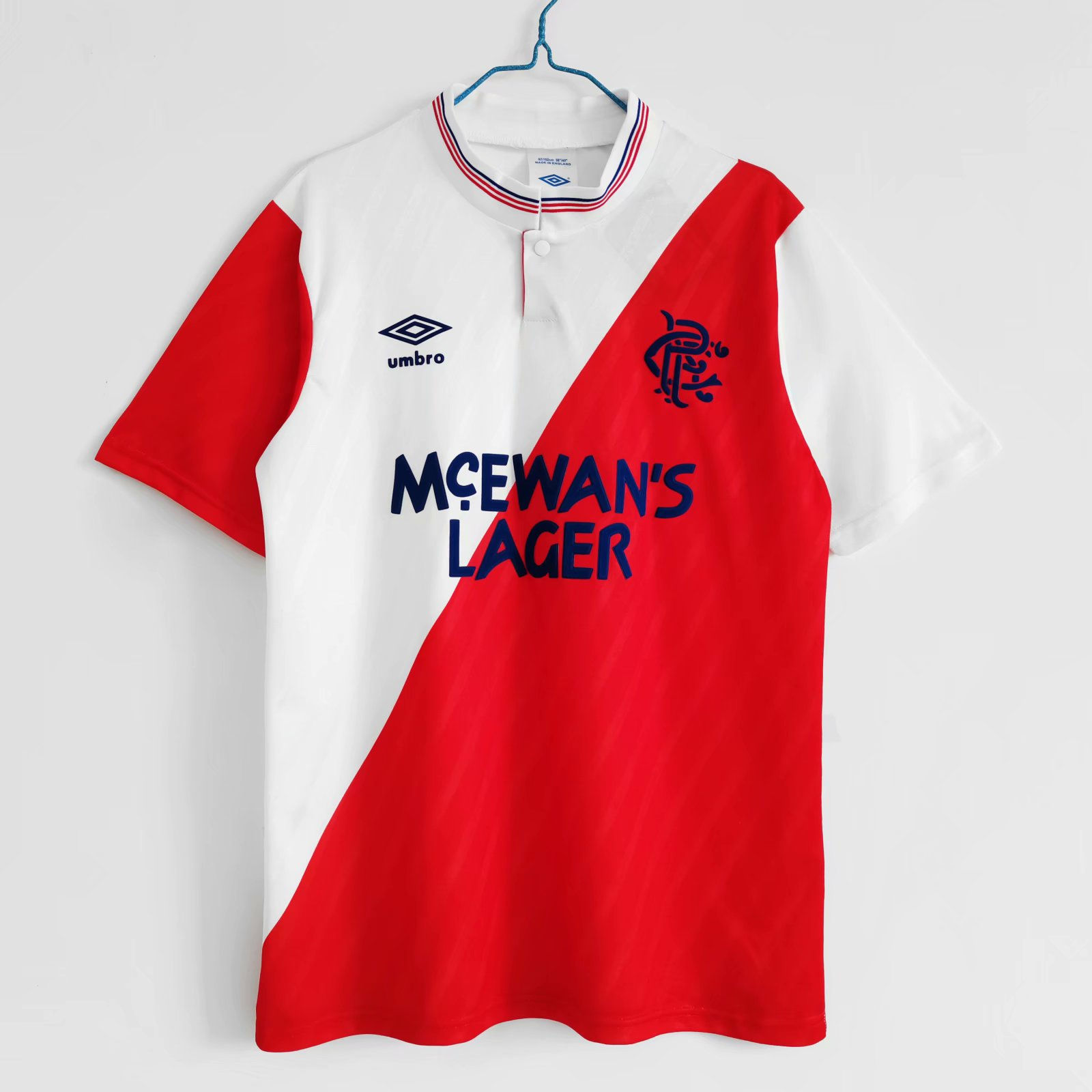Rangers football shirt with Umbro logo, McEwan's Lager, red and white design.