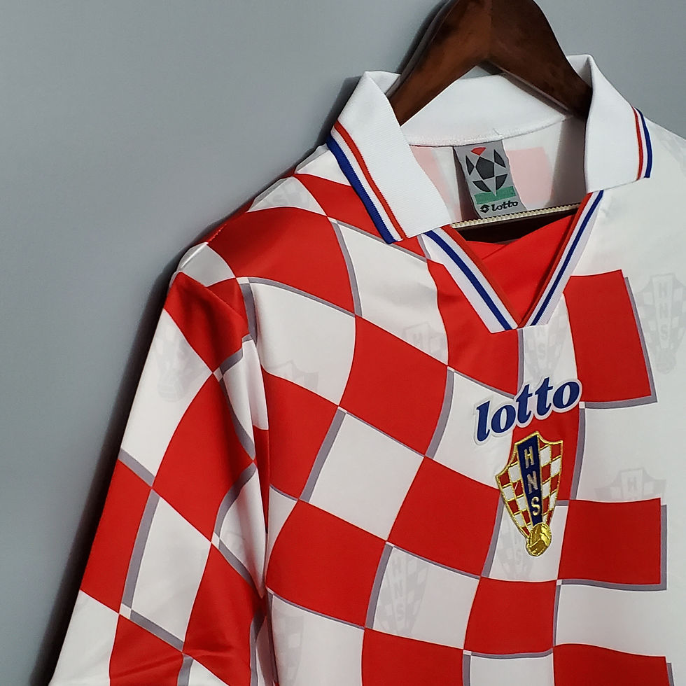 Thumbnail: Croatia national team jersey with Lotto logo. Iconic red and white checkered pattern.