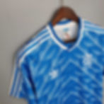 Blue soccer jersey with Adidas logo; retro, nostalgic design. Nostalgia Retro Kit