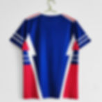 Blue football shirt with red and white detailing. Nostalgia Retro Kit.