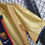 Thumbnail: FC Barcelona gold jersey with crest and Nike logo, retro kit.