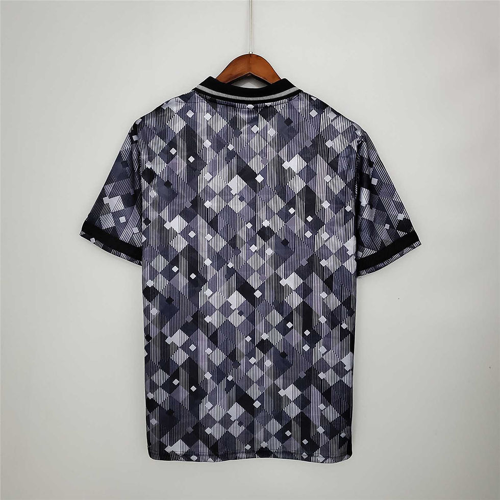 Thumbnail: Black and grey retro jersey on a hanger, Barcelona kit design.
