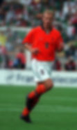Thumbnail: Football player running in orange jersey with number eight. 1995/1996 AJAX AMSTERDAM HOME RETRO KIT.