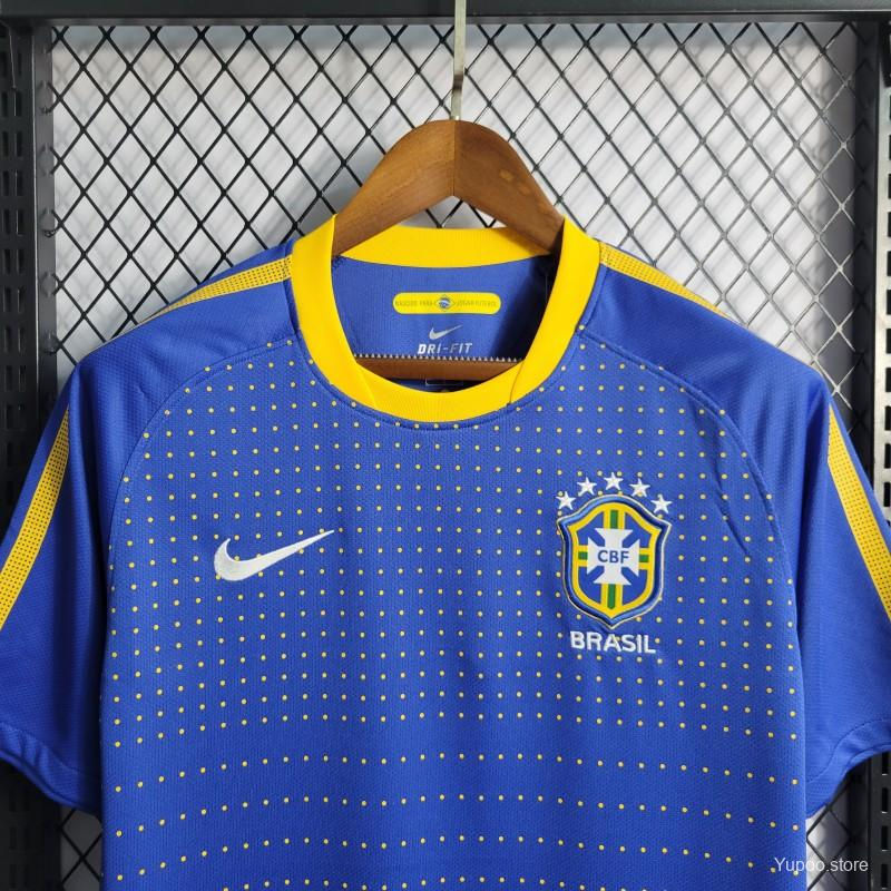 Thumbnail: Blue Brazil football jersey with yellow collar and Nike logo, hanging