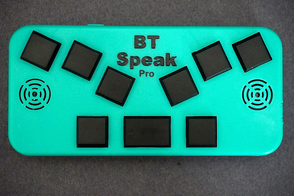Top-down image of the BT Speak showing its 9 key ergonomic keyboard