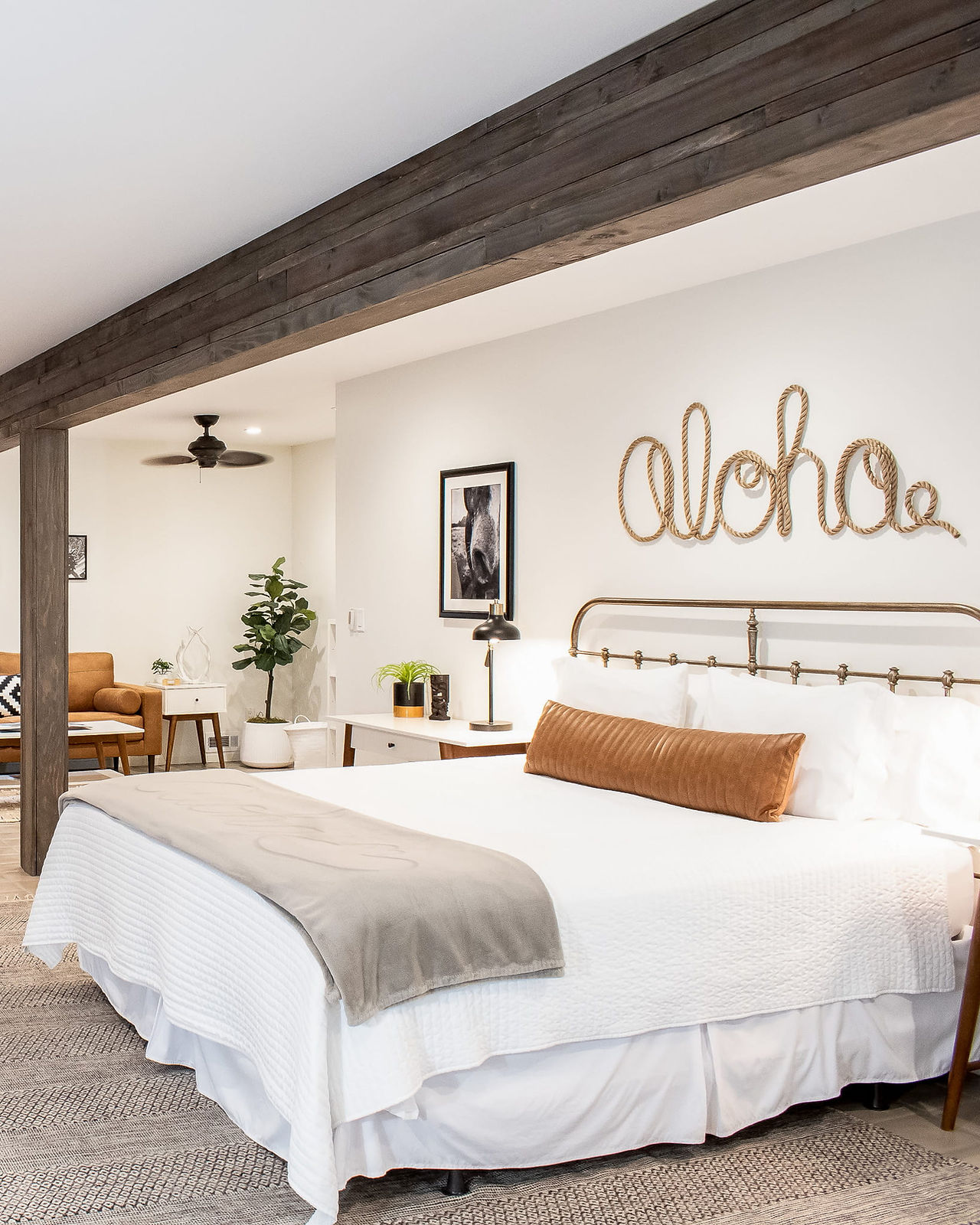 Cozy bedroom suite with aloha decor at North Shore Lookout Maui