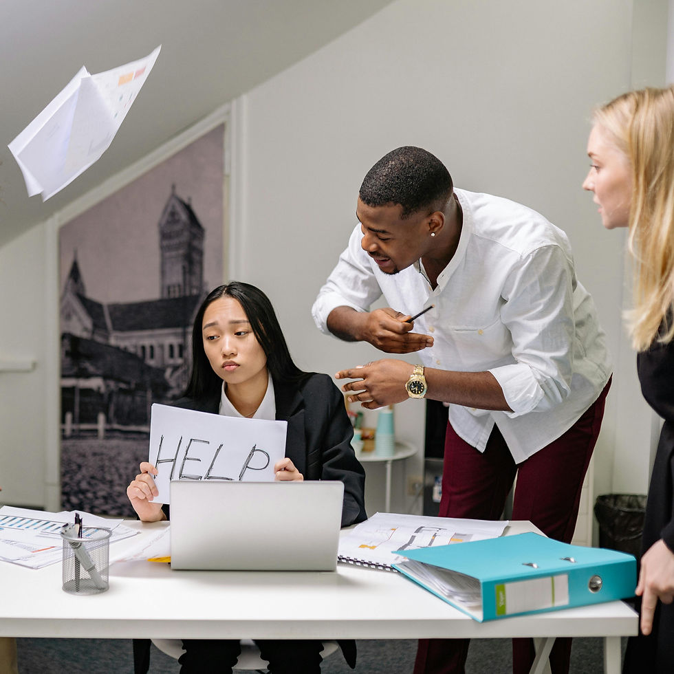 High angle view of a person reviewing HR organization brochures on a desk