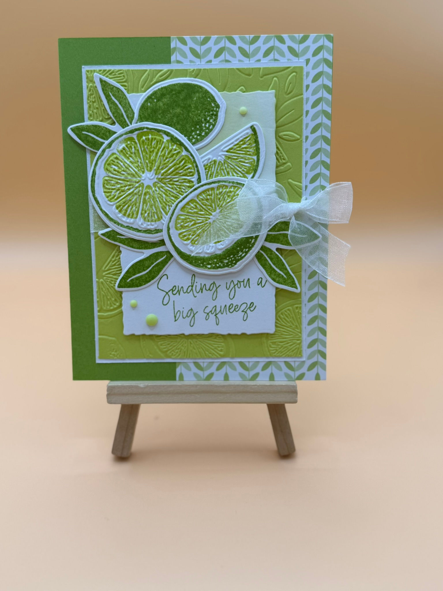 Sentiment - "Sending you a Big Squeeze" embossed citrus patterns