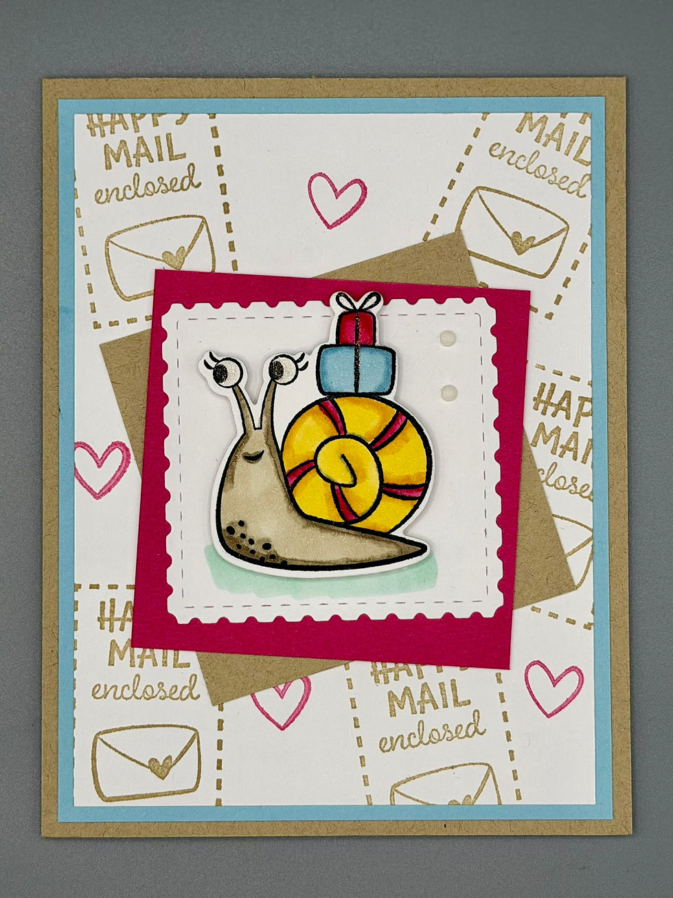 Thumbnail: Side view of handmade “Happy Mail” snail greeting card on easel, showing layered paper textures and dimensional snail illustr
