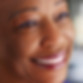 A close-up of an elderly black woman looking into the distance.jpg