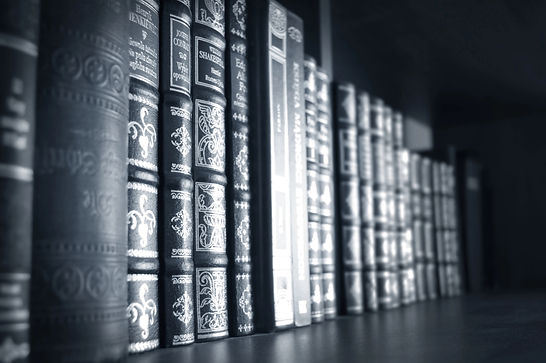 Row of antique books on shelf