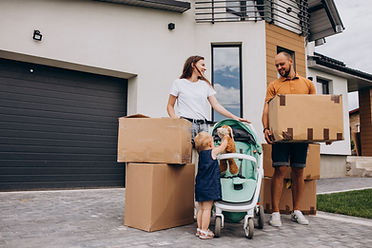 young-family-with-little-daughter-moving-into-new-house