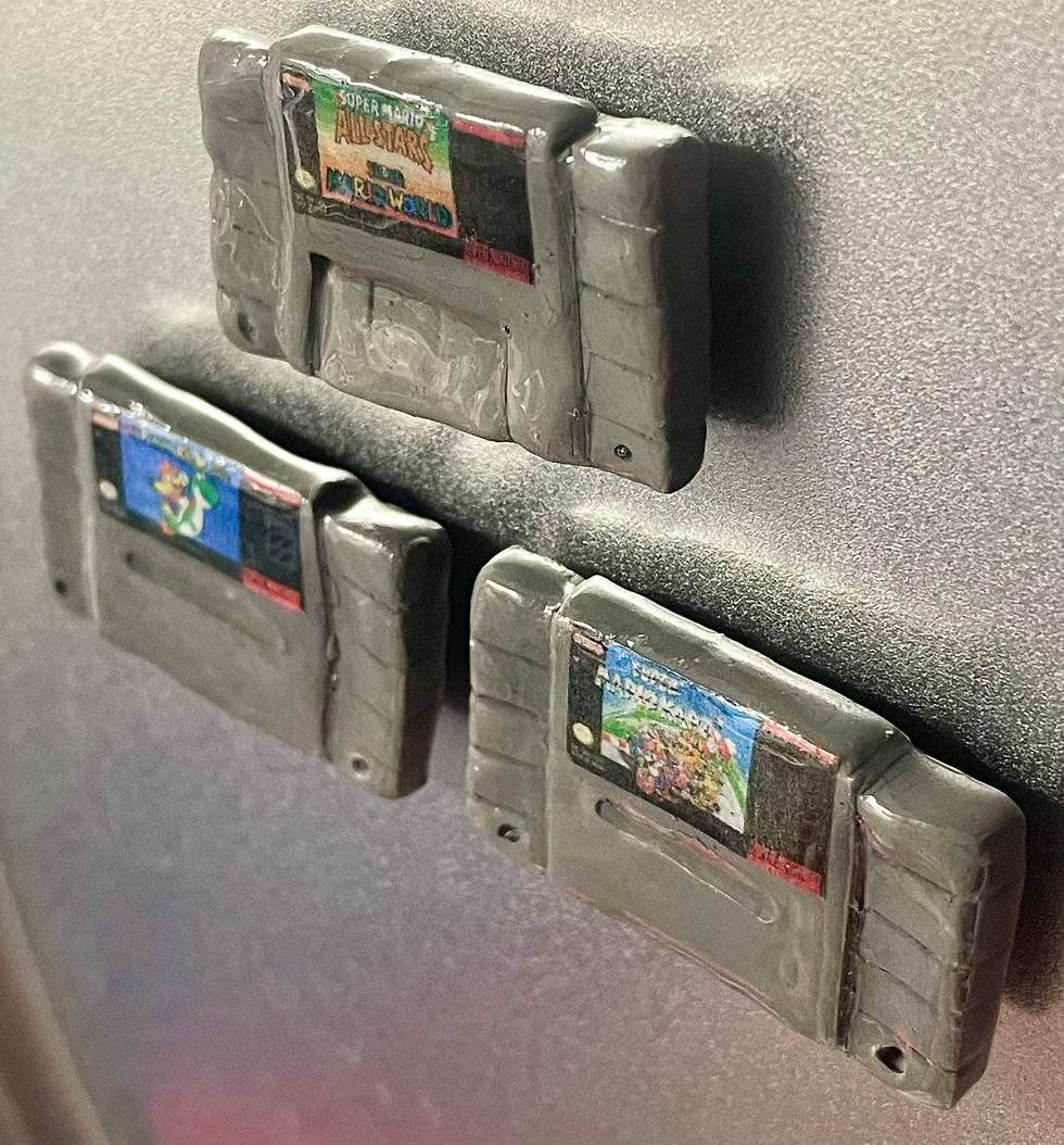 magnets of super nintendo snes game cartridges of super mario and mario all stars and mario kart