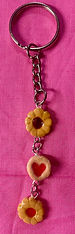 keychain of Italian butter cookies with red jelly filling and chocolate filling