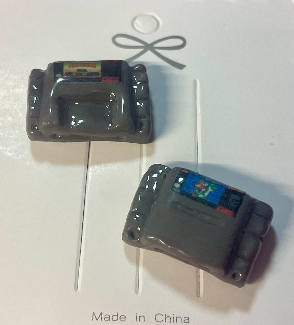 Two pins of super nintendo snes game cartridges of mario all stars mario world and super mario