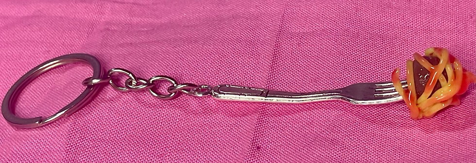 Thumbnail: keychain of a giant fork with a meatball on the prongs wrapped in spaghetti and red tomato sauce