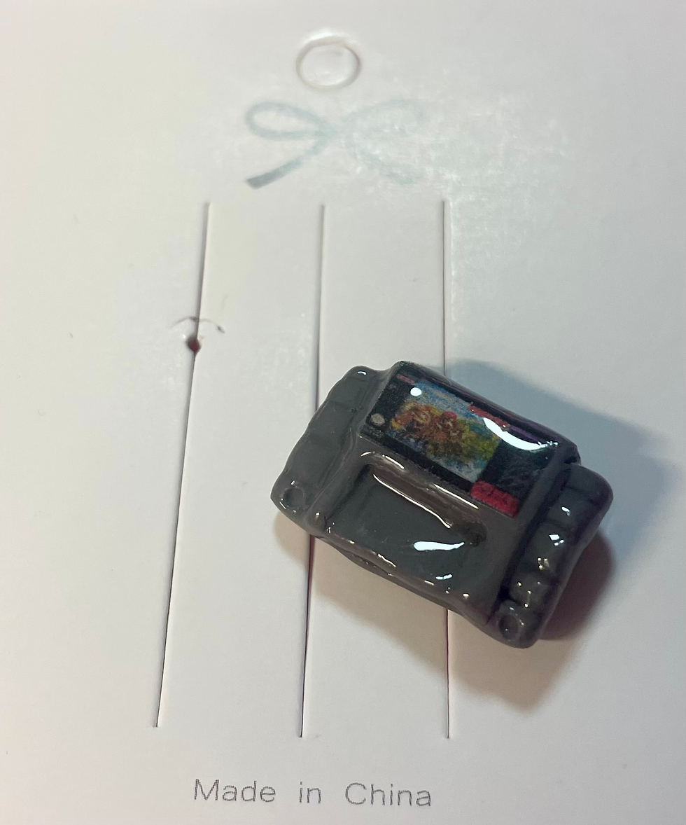 lapel pin of super nintendo snes game cartridge of donkey kong country 3