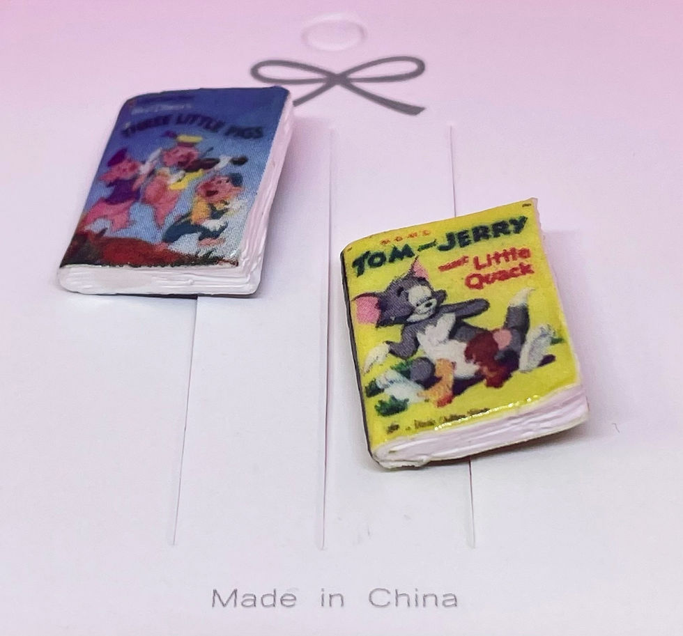 pins of two books the three little pigs and tom and jerry by little golden books