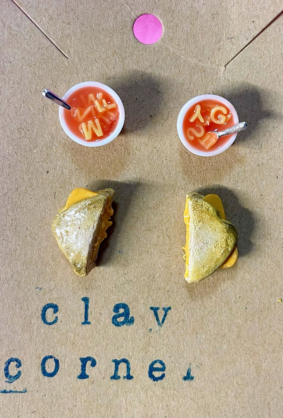 stud earrings of red alphabet soup with tiny spoons with grilled cheese slices and melted cheese