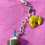 Thumbnail: phone charm of starbucks iced caramel latte with whipped cream and ice and croissant pastries
