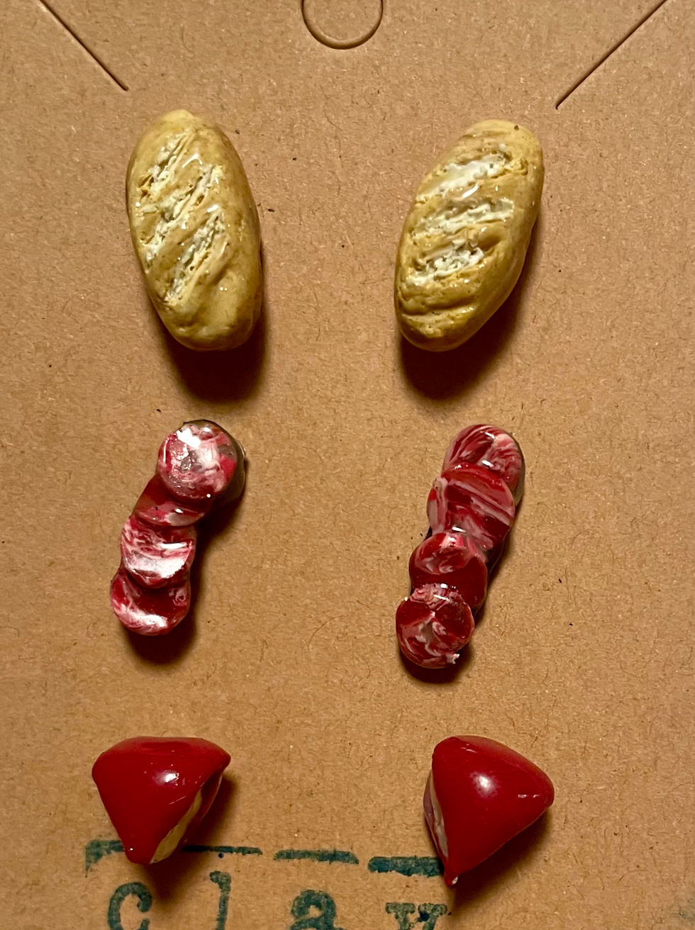 stud earrings of italian bread and salami slices and slices of babybel red and yellow cheese they are 3 pairs of stud earring