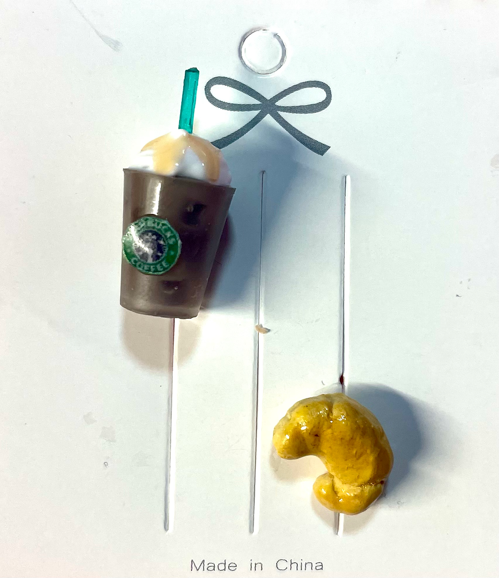 pins of starbucks iced caramel latte with whipped cream and ice and croissant pastries
