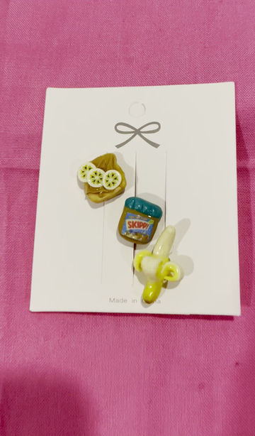 Thumbnail: pins of a slice of bread with peanut butter and bananas and and a whole banana and a peanut butter jar