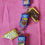 Thumbnail: keychain of 4 pop tarts including blue wild berry, cherry, strawberry and smores poptart, all pop tarts have a bite mark