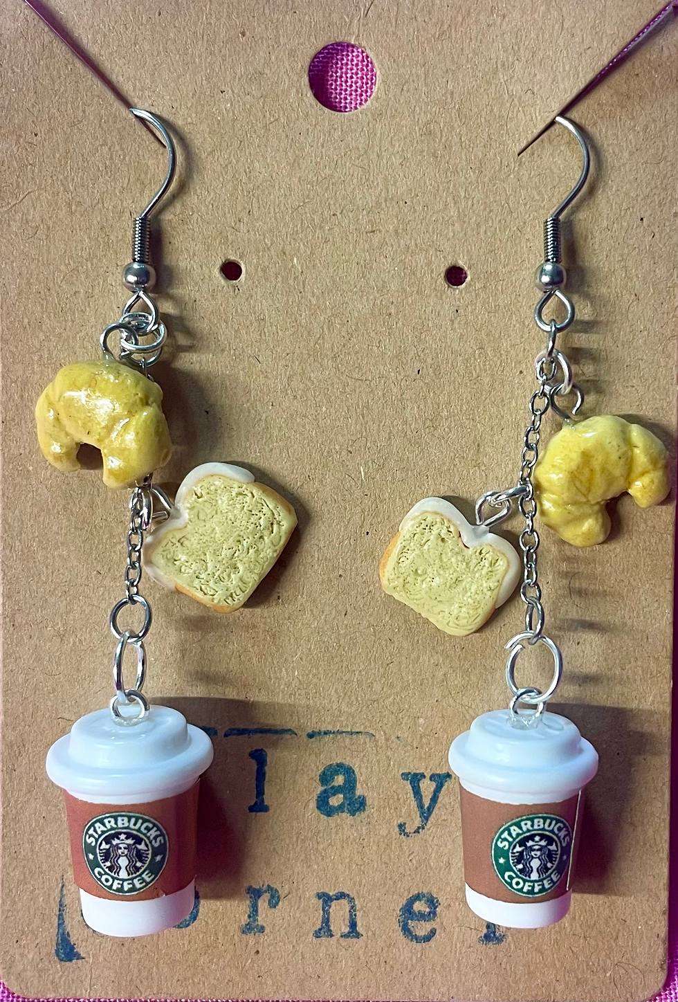 Dangle earrings of starbucks hot coffee in a white cup with a lid and a croissant and lemon loaf pastry