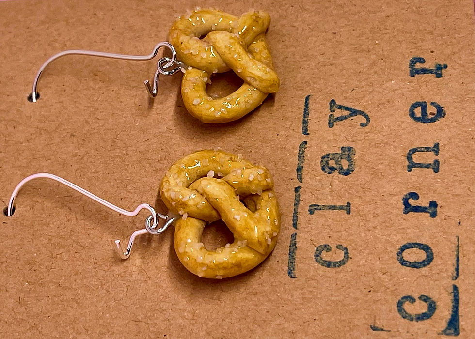 Thumbnail: dangle earrings of salted pretzel knots